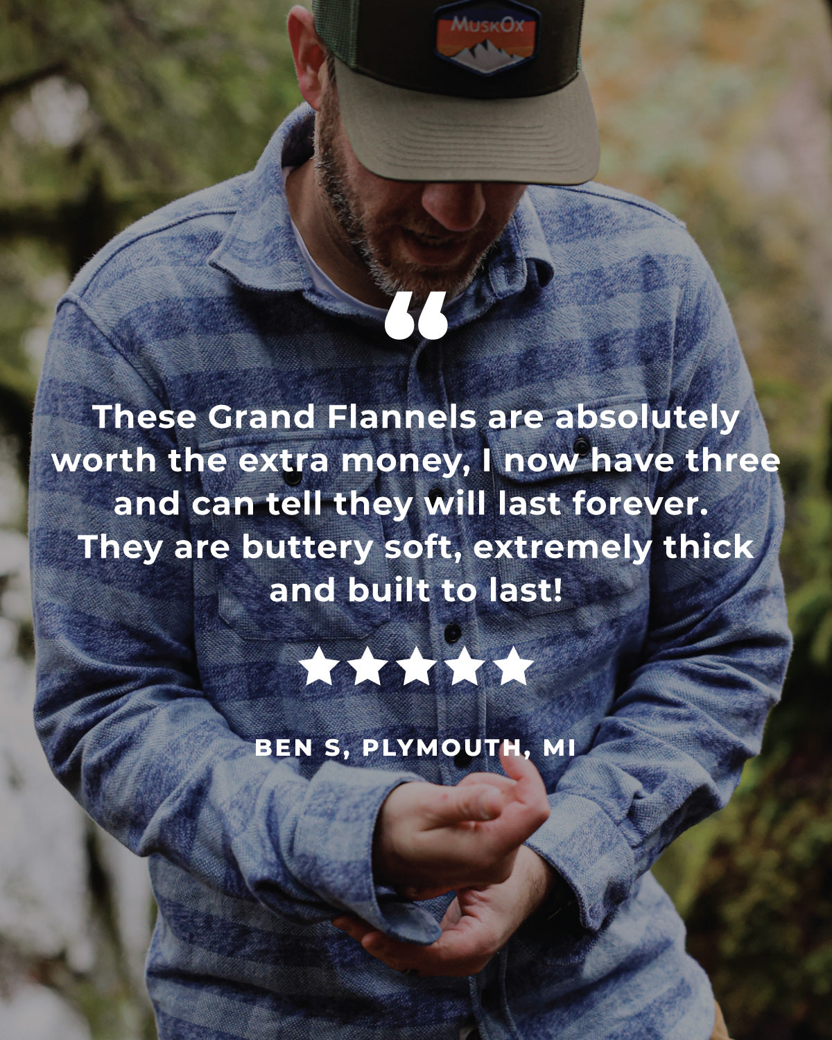 Man wearing a blue plaid shirt and cap with a quote about Grand Flannels.
