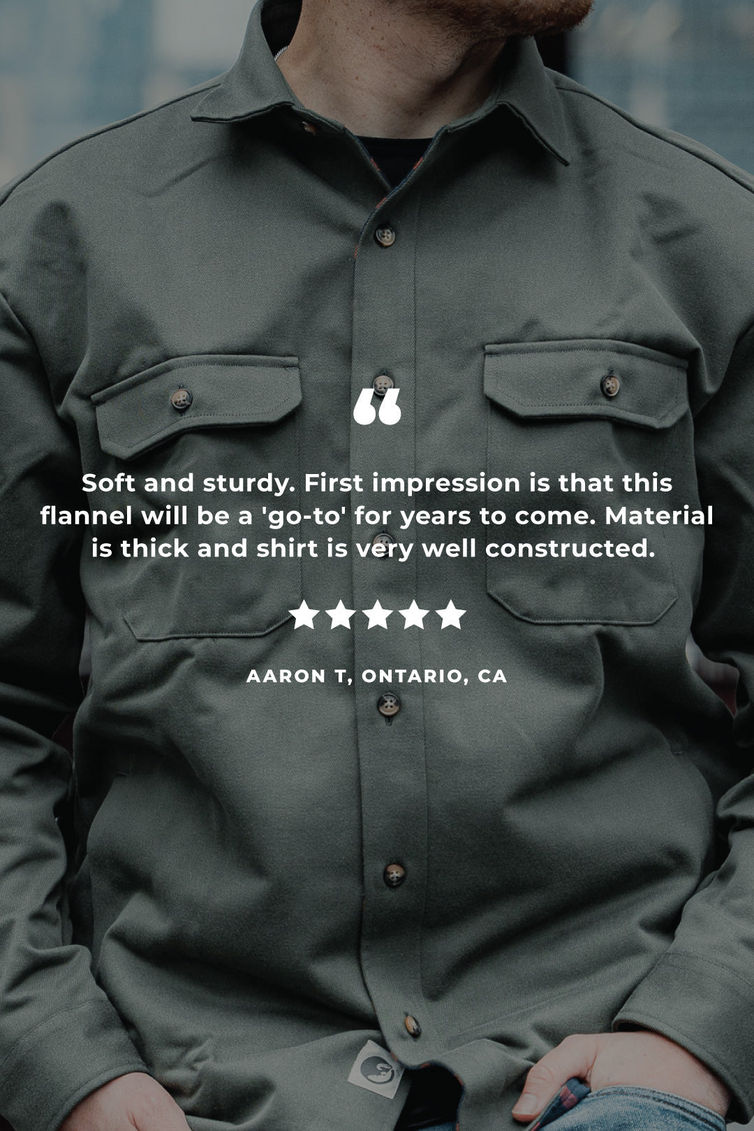 Person wearing a green flannel shirt with customer review text overlay
